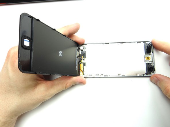 Don't open iPod past a 90° angle.  Continue holding it open at a 90° angle for the next several steps.