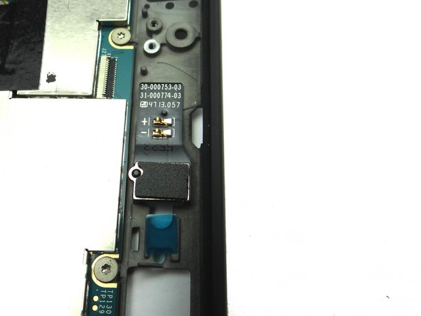 Press firmly into place to adhere to rear case.