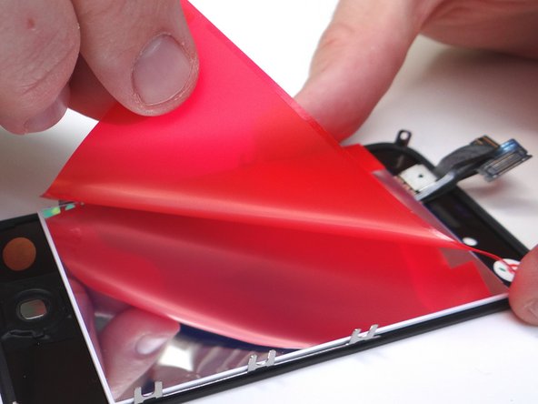 If you're replacing the screen, remove the protective film from the back.