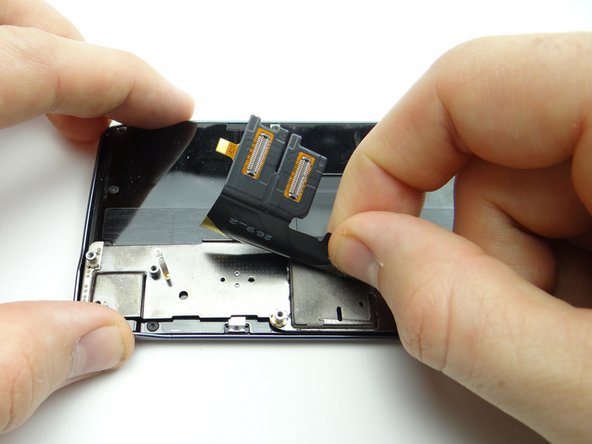 Picture 2: Peel up display cable and fold it backwards.