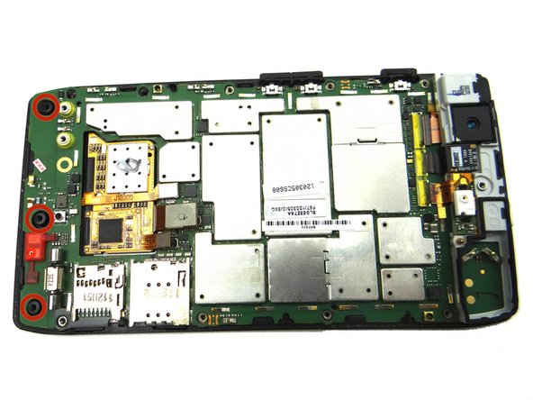 Picture 2: Feed the three black standoffs at the bottom of the display through the logic board.