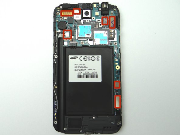 Reconnect the seven ribbon cable connectors to the logic board.