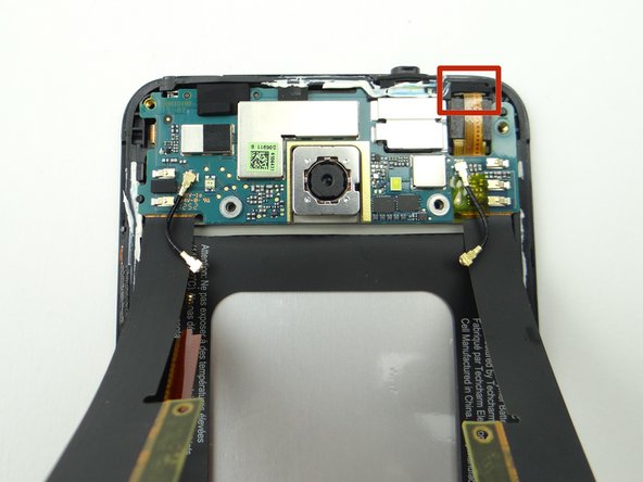 Dislodge microphone, but don't try to remove it.