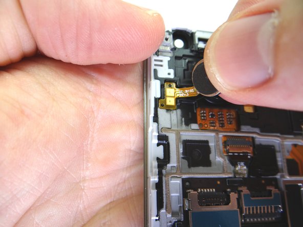 Picture 2: Carefully peel up the vibrator with your fingers.