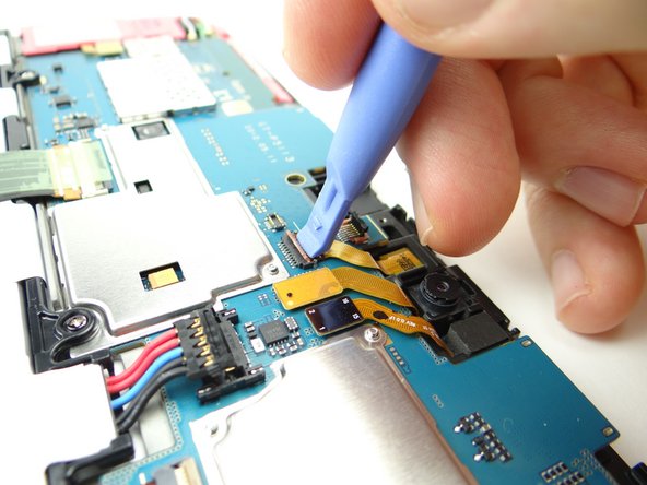 Picture 1: Use the blue pry tool to push ZIF connector open.