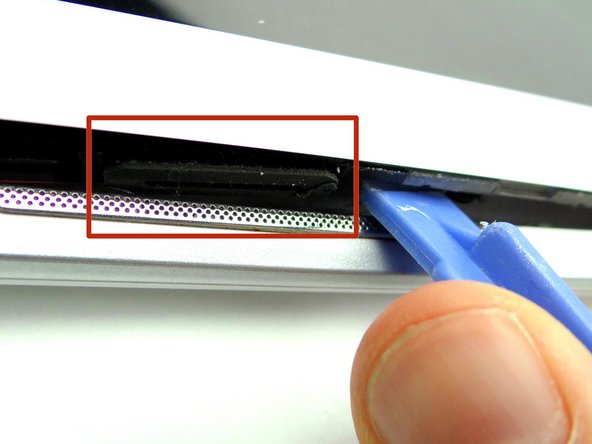 Picture 3: Continue prying up until you can see the rubber piece on the speaker (red square).