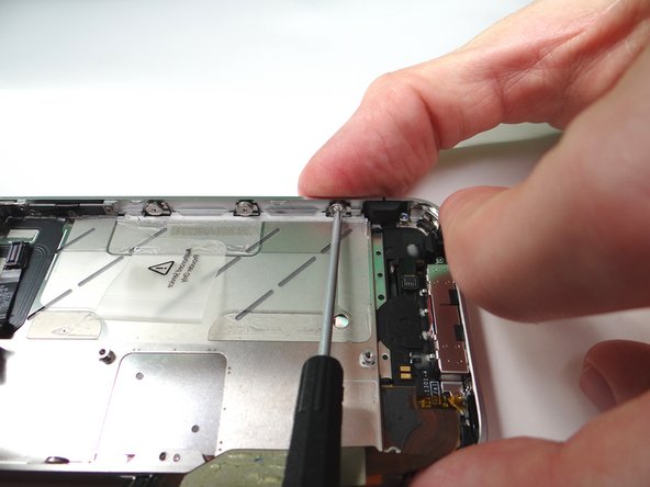 Picture 1: tighten the three large-head Phillips screws along the right side of the iPhone.