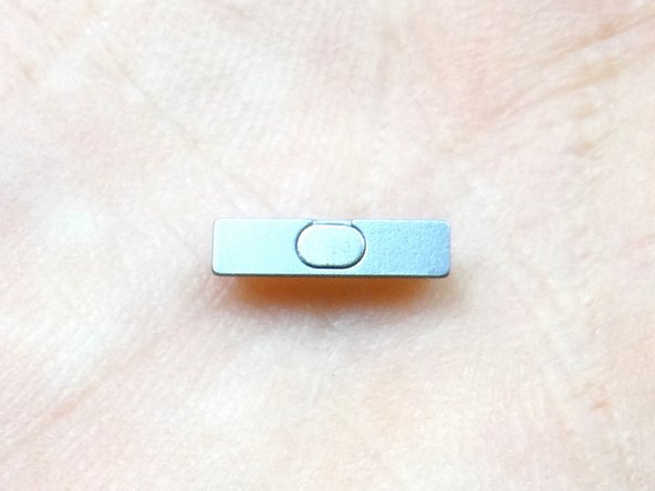 Picture 1: Retrieve the power button from COMPARTMENT E.  Maintain the orientation when seating the power button.