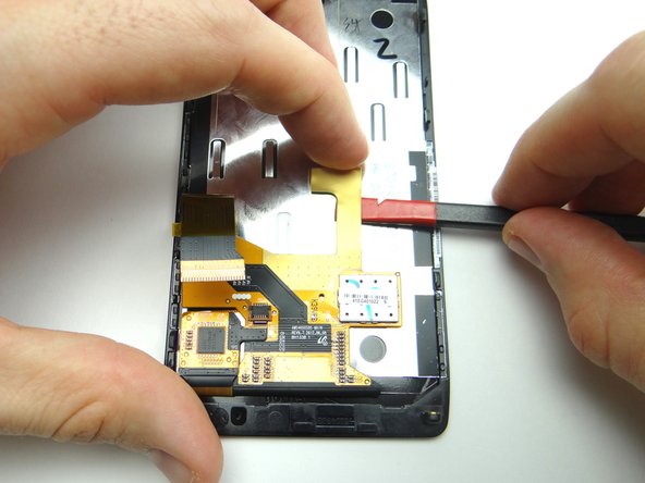 Picture 1: Apply low-level heat (100° Celsius) to the display cable for 1 minute.