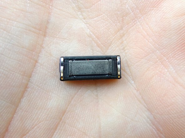 Replace earpiece speaker from COMPARTMENT D.