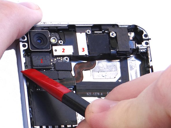 Before performing this step, make sure the Black Spudger is wedged under the lip of the cable.  Also, be careful not to break any components off the surrounding area on the logic board: