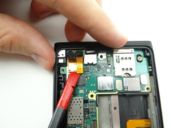 Use the flat end of the spudger to disconnect front-facing camera &amp; proximity sensor assembly.