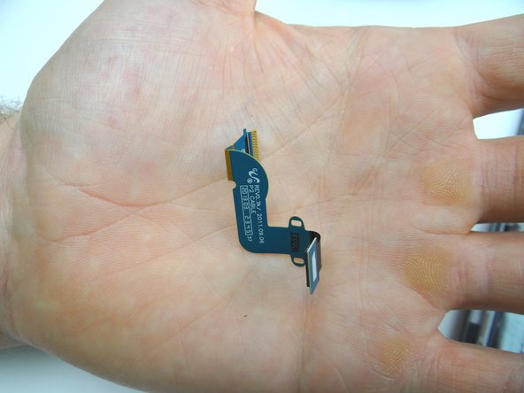 Place LCD cable in ZONE III.