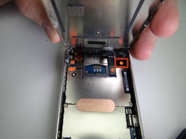 Use your finger to reconnect cable '2' then cable '1'.