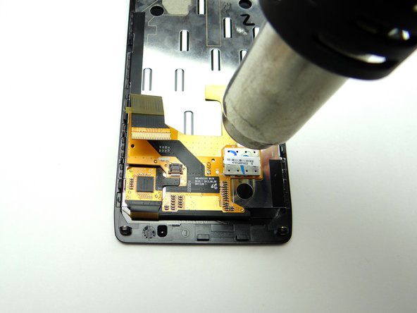 Adhesive holds the display cable in place: