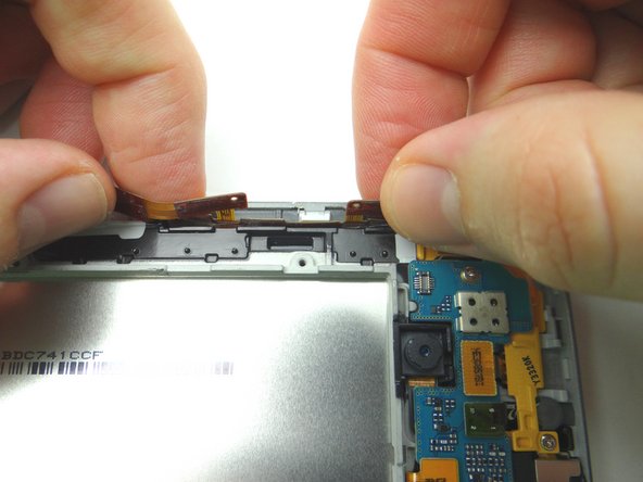 Adhere the cable to the black wall of the front panel.