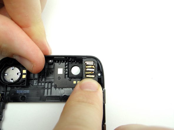 Push the adhesive frame back into place.