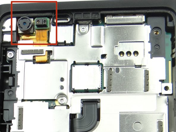 It may take some fiddling to get the front-facing camera &amp; proximity sensor assembly properly seated in the display sockets (red square) as you close the device over the next few steps.