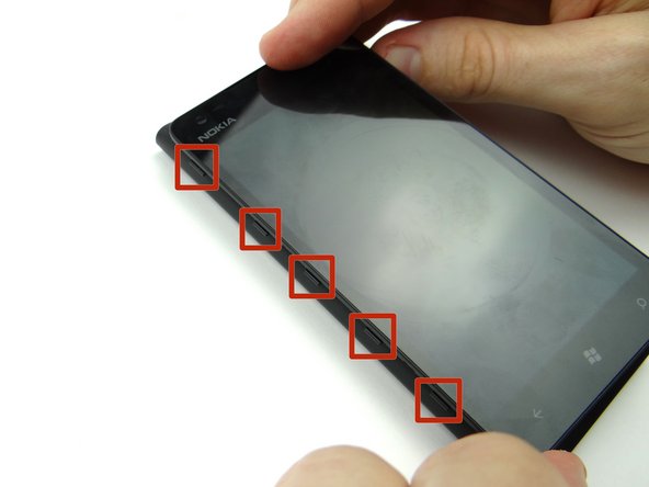 Pictures 1 &amp; 2: Lift screen up slightly.  Maneuver the clips on the left side over the top of the rear case.