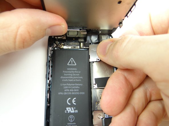 Picture 3: Remove cable shield held down by the screws.  Place in COMPARTMENT B.