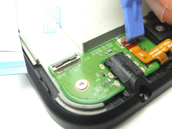 Picture 1: Open ZIF connector holding volume &amp; power buttons cable.