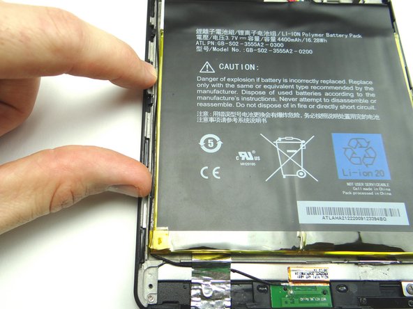 Thread antenna along the left edge of the battery.