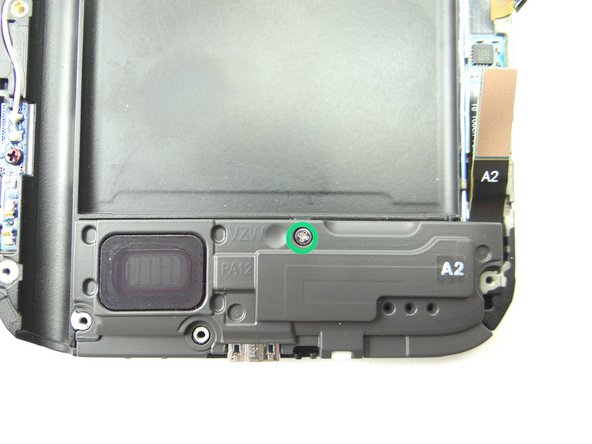 Use the #00 Phillips Screwdriver to screw the 2.0 mm screw, from COMPARTMENT F, into the front assembly.