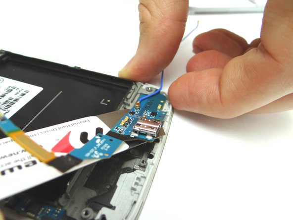 Take care not to scrape black paint off the metal bezel (marked in red in Picture 2) while you're prying.