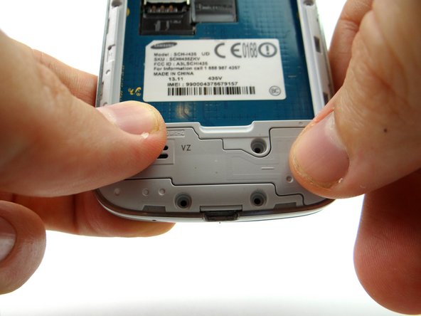 Picture 1: Line up mid-frame with front panel. Seat bottom near charging port first.