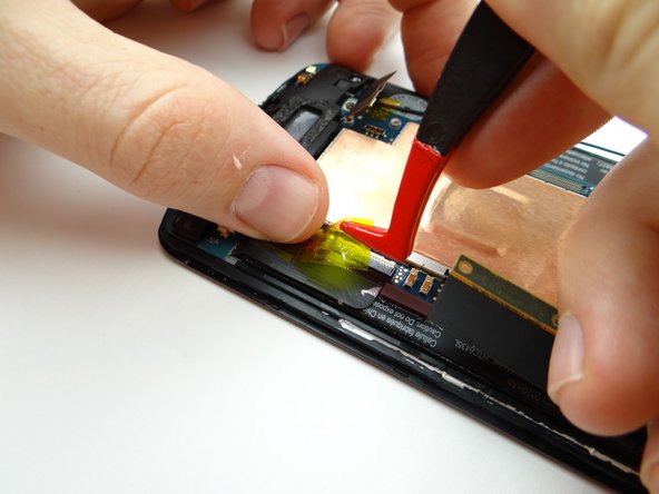 Picture 1: Remove Kapton tape from charging port connector cable.