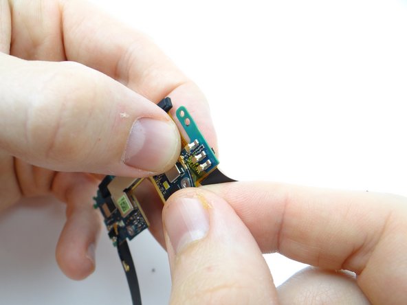 Daughter board remains with Power Button Contact / Headphone Jack / Upper Microphone / SIM Tray Slot.