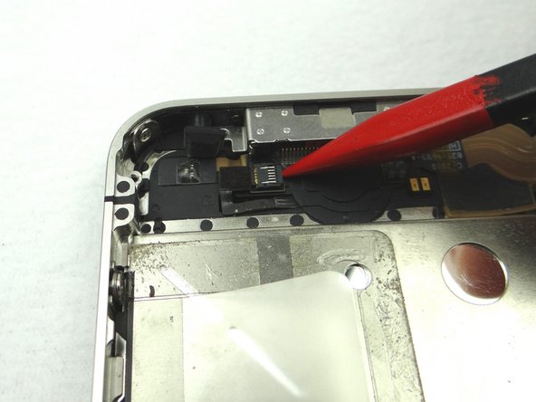 Picture 3: Use the pointed edge of the Black Spudger to flip the ZIF connector to the &quot;closed&quot; position