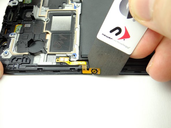 Read through this entire step before performing it if you intend to reuse the power button cable: