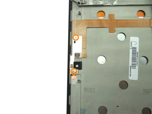 Pictures 2 &amp; 3: Remove two 3.2 mm #00 Phillips screws and place in SLOT 9.  The bottom screw is covered by copper tape - simply push the screwdriver through the tape.