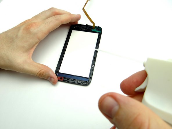If you're reusing the digitizer, clean it with a chamois cloth and compressed air.