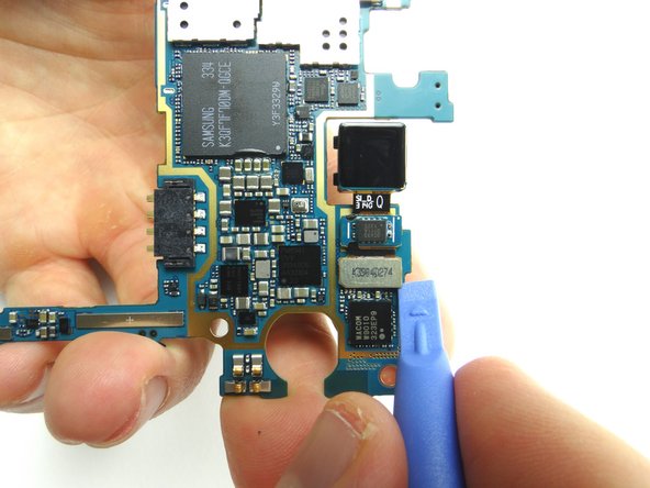 Remove rear-facing camera from underside of logic board.  Place in COMPARTMENT B.