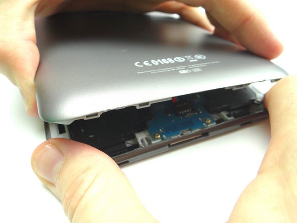 Picture 1: Pull up the battery cover until you feel tension near the SD card slot and/or volume rocker: