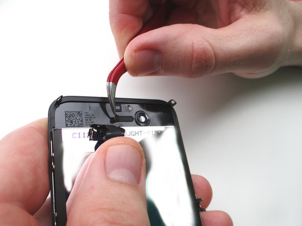 The replacement display may or may not come with the earpiece mesh installed: