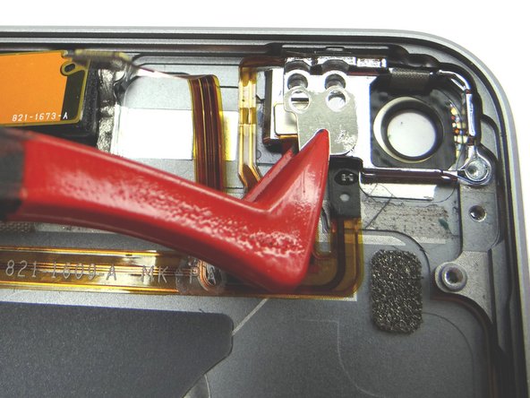 Picture 2: Use plastic tweezers to remove small plate.  Place in COMPARTMENT E.