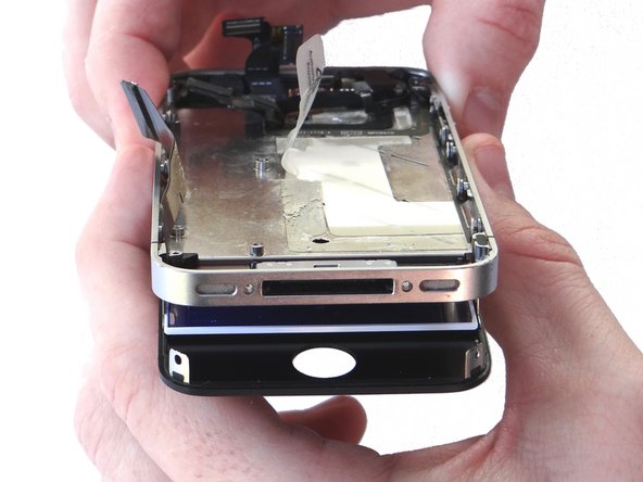Picture 1: With the iPhone face down, separate the bottom of the display assembly from the mid-frame.