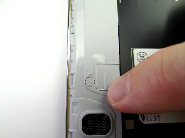 From COMPARTMENT B, snap the home button connector cover back into place.