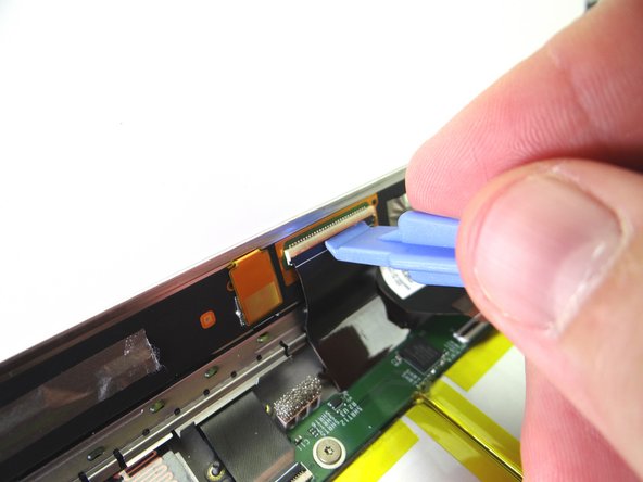 You'll need a piece of Kapton tape for reassembly to help hold this display cable in place.