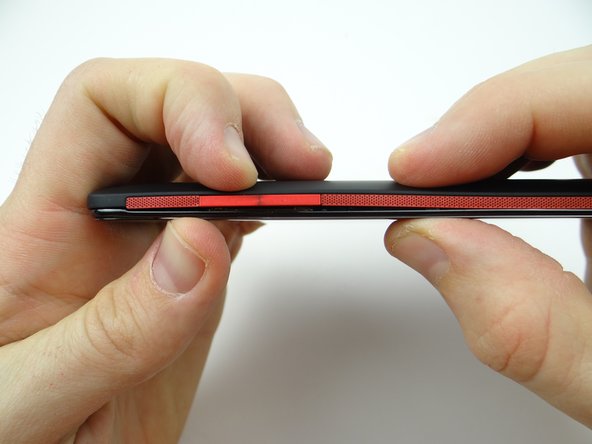 Work your way around the perimeter making sure all battery cover clips are snapped in place.