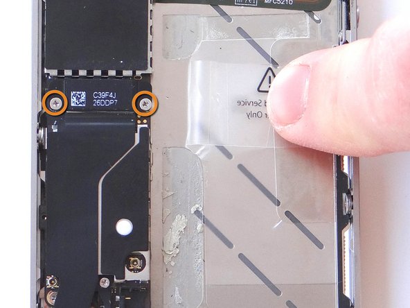 Replace the charging port assembly shield from SLOT 8 and secure it with Phillips screws also from SLOT 8.