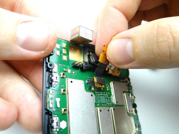 Picture 1: Seat front-facing camera in its socket first.