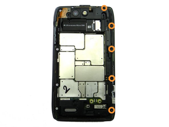 Picture 2: From the right side of the phone, remove five 4.3 mm black T5 Torx screws.  Place in SLOT 5.