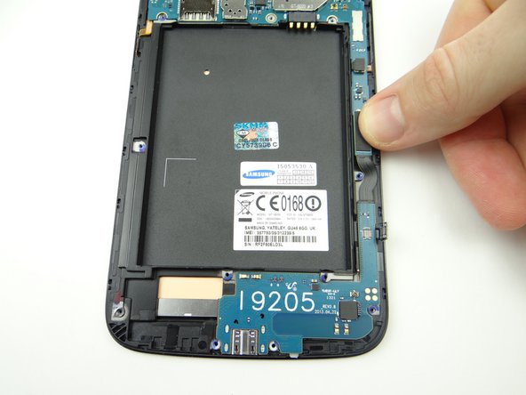 Connect charging port cable to main logic board.