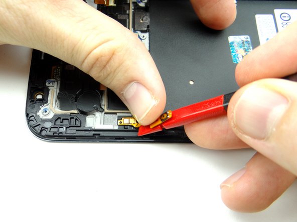 Picture 1: Use the iSesamo to separate the power button from the front panel.