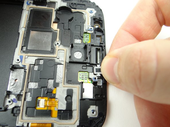 Replace the lower microphone cover from COMPARTMENT F.