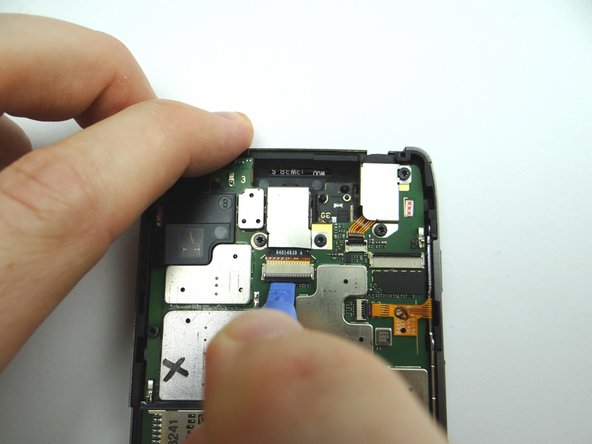 Picture 2: Use blue pry tool to open ZIF connector.